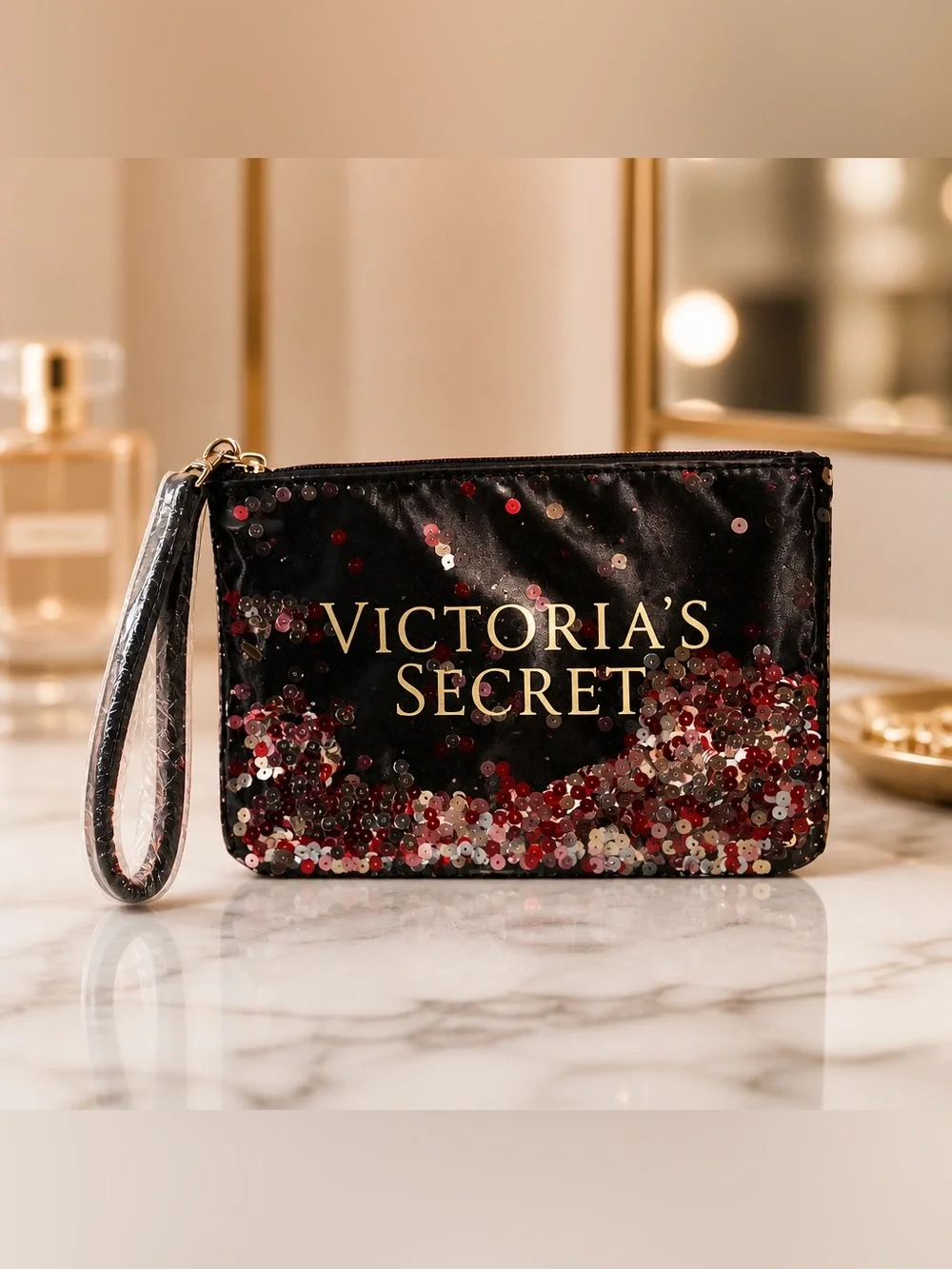 Victoria's Secret Floating Confetti Sequin Wristlet Pouch.